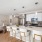 kitchen with barstools and dining area